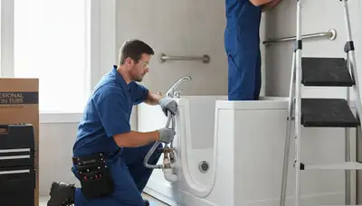 Walk-in tub installation by Fort Wayne, IN plumbers for safer home bathing